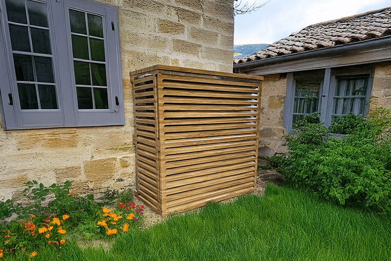 dissimuler une pompe à chaleur dans le jardin